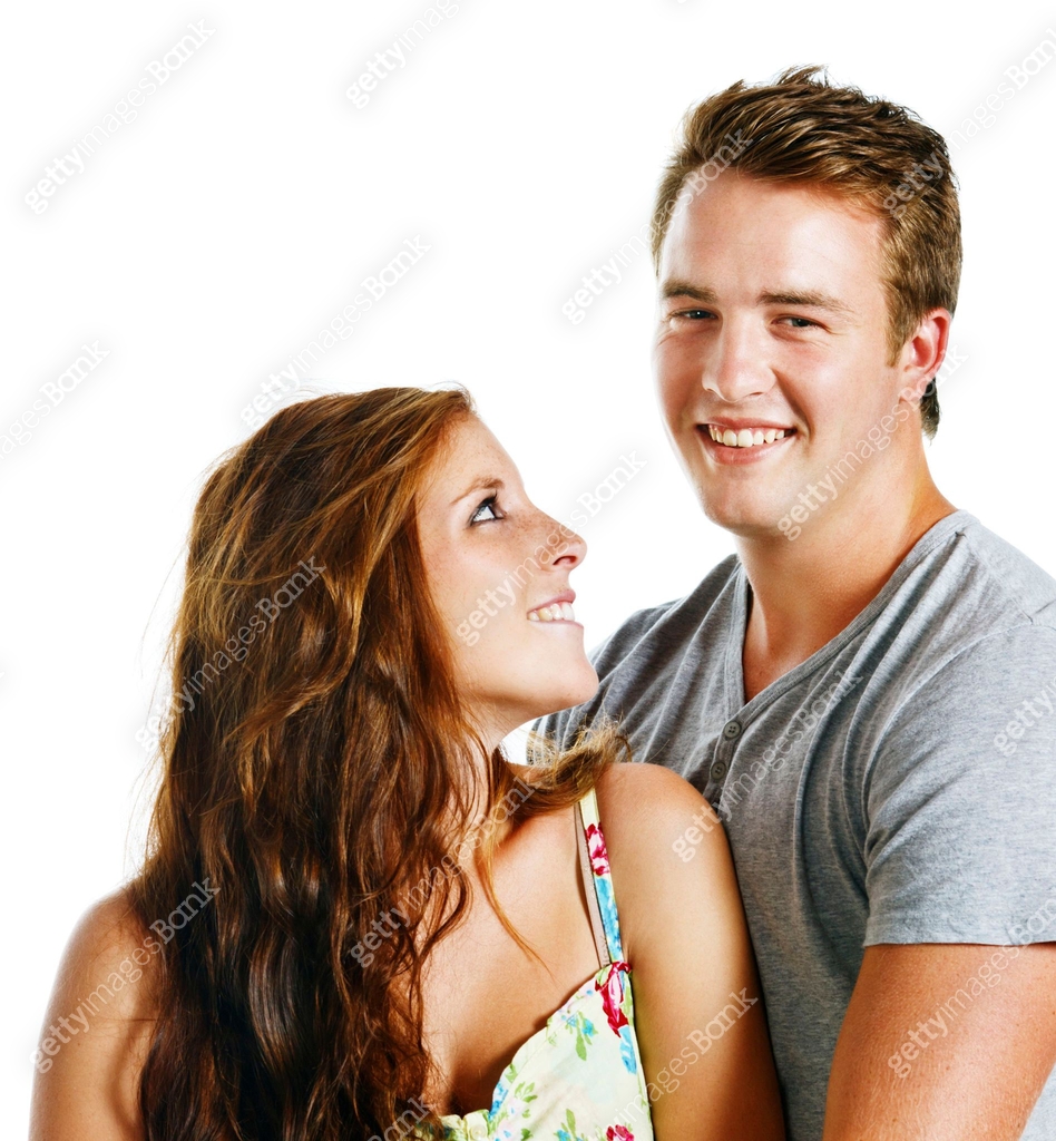 Lovingly smiling young couple in embrace 이미지 (175435417) - 게티이미지뱅크