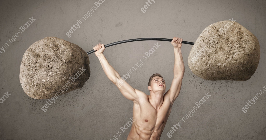 Ray Lifting Rocks muscular man lifting large rock stone weights 이미지 (464219717) - 게티이미지뱅크