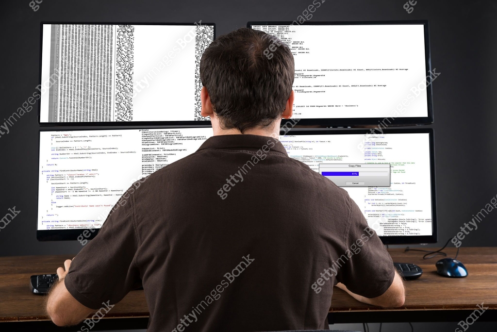 Man Programming Code On Computers 이미지 (518433812) - 게티이미지뱅크