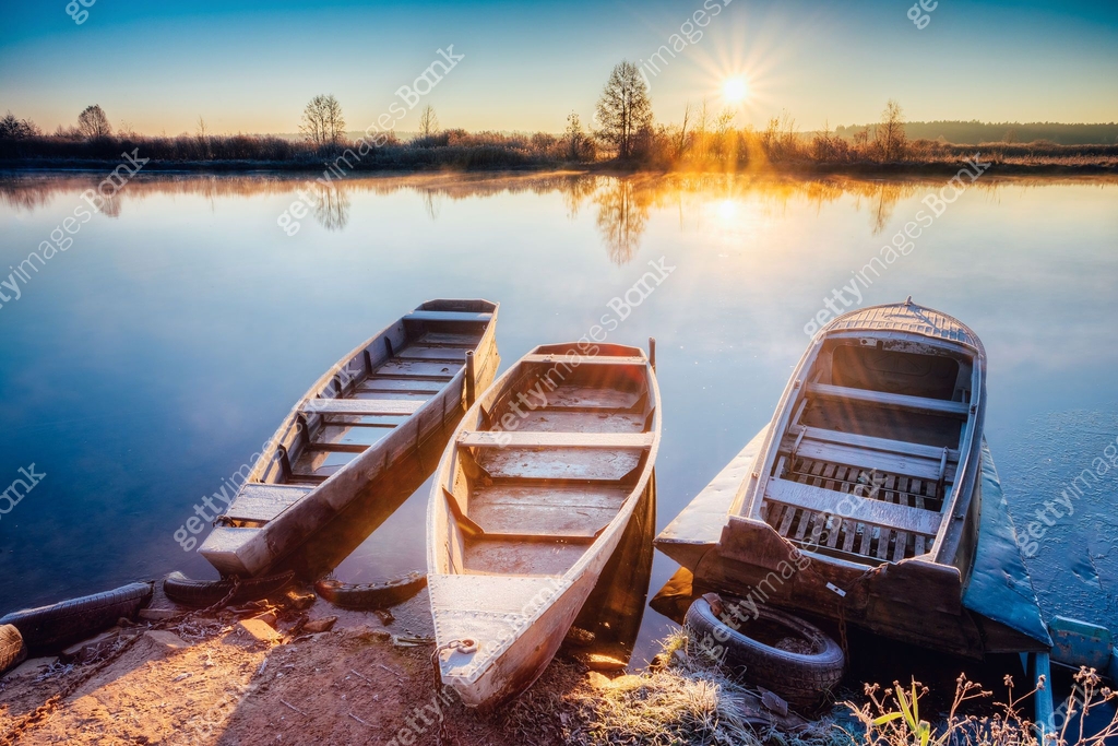 River and old wooden rowing fishing boat at beautiful sunrise 이미지 ...