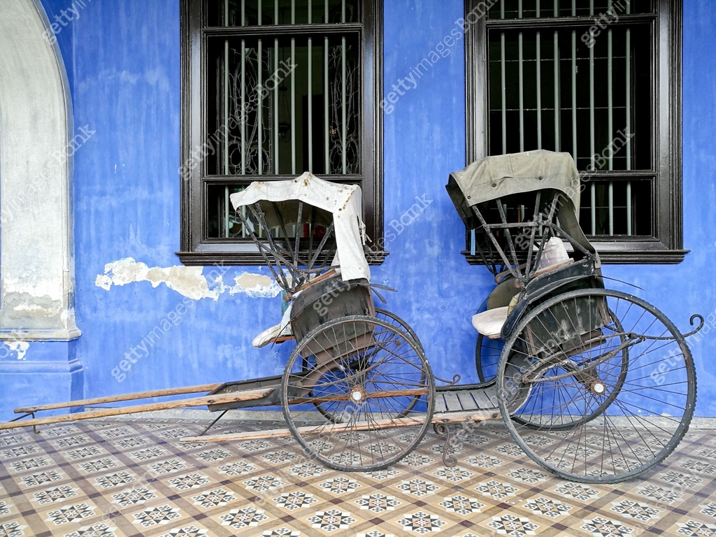 Finland Rickshaw Old vintage traditional rickshaws in front of blue building in Penang ...