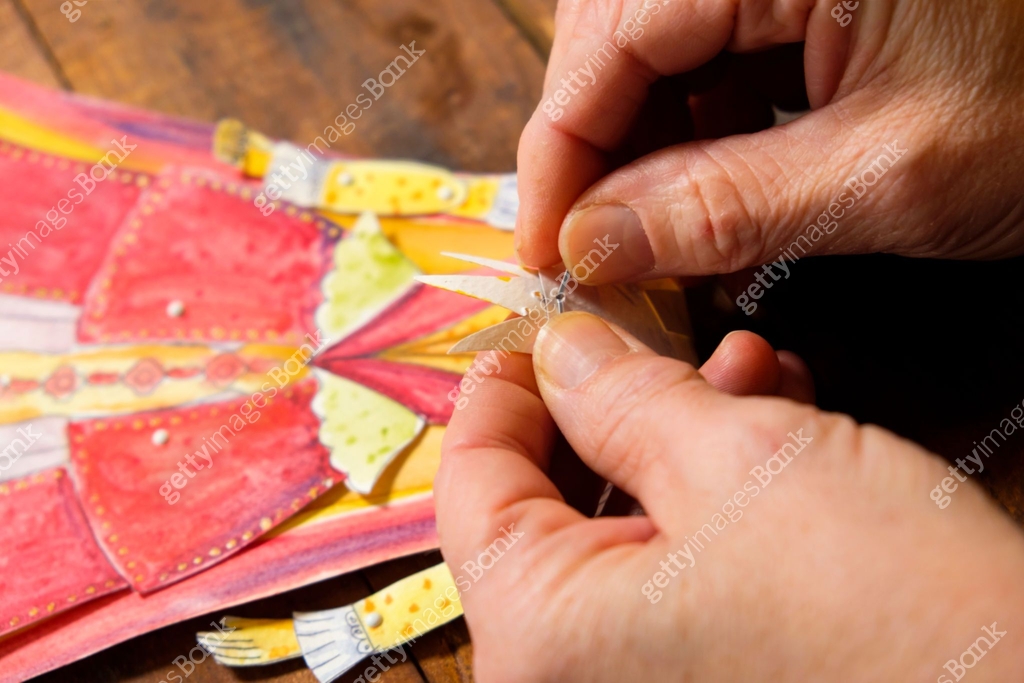 Mature hands Making A Hand painted Paper Doll Of A Queen 이미지 (922506030 ...