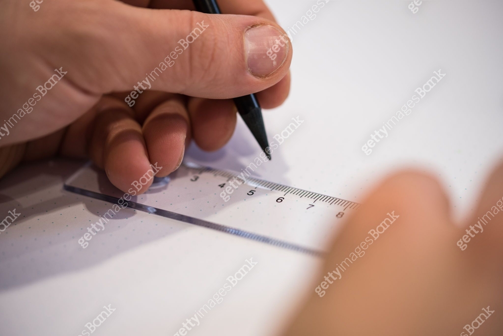 People Who Write Using A Ruler Person using a ruler and a pen 이미지 (912944718) - 게티이미지뱅크