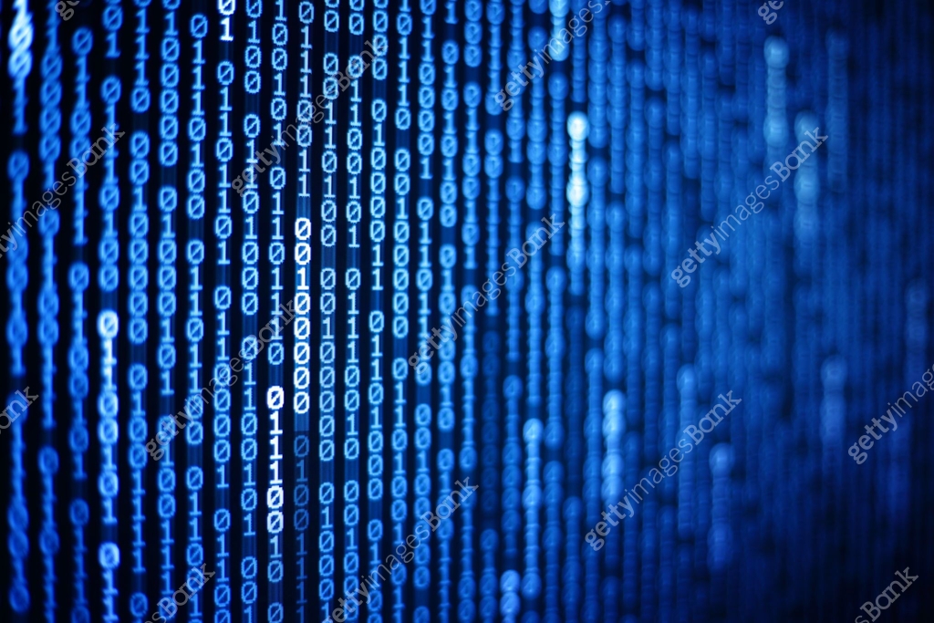 Technology Age. binary code information bit on computer monitor screen ...