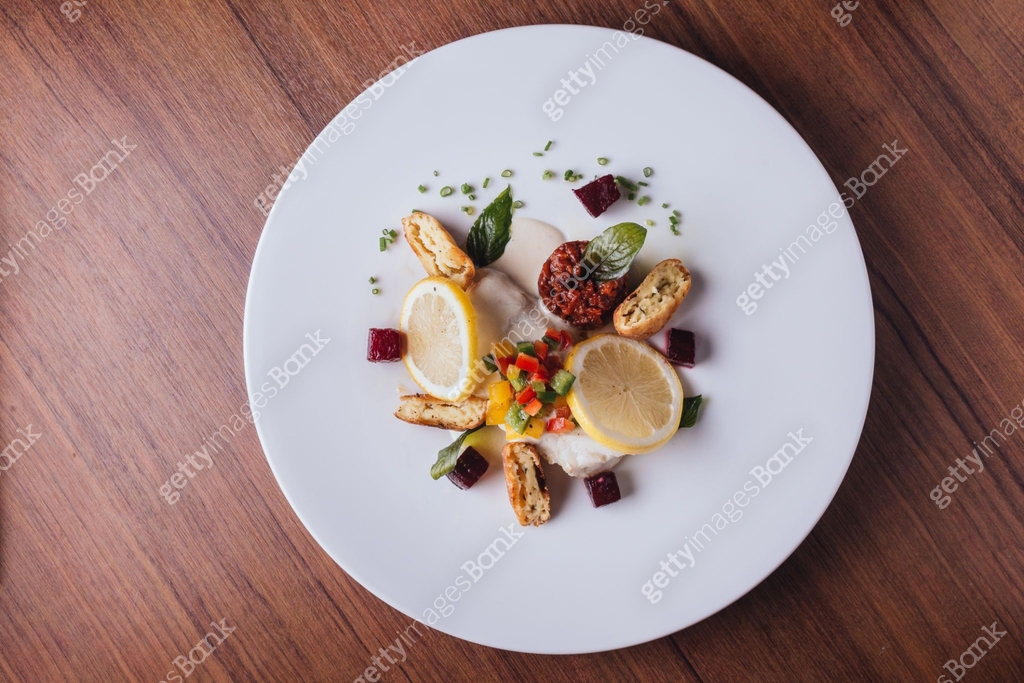 Cod fish fillet pan baked in lemon with cos, beet root, string bean ...