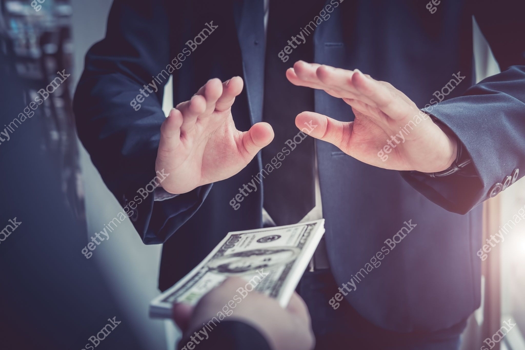 Business man refusing money to take the bribe the concept of corruption ...