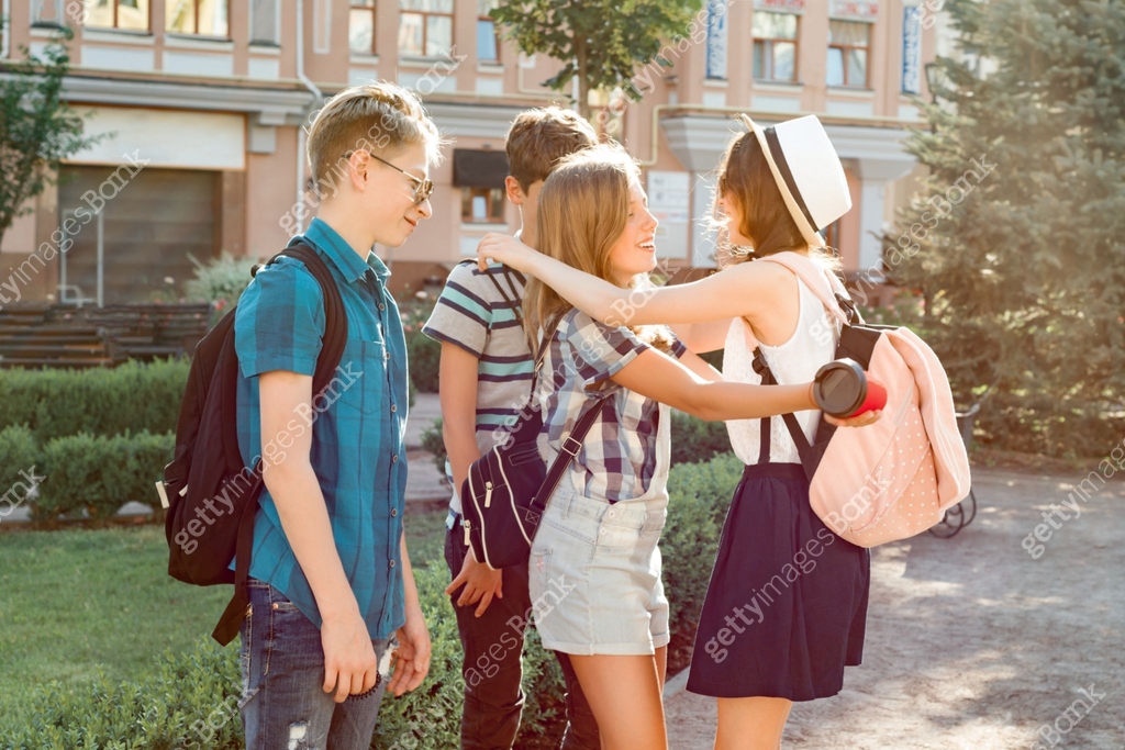 Meeting Smiling Friends Teenagers In The City Happy Young People meeting-smiling-friends-teenagers-in-the-city-happy-young-people