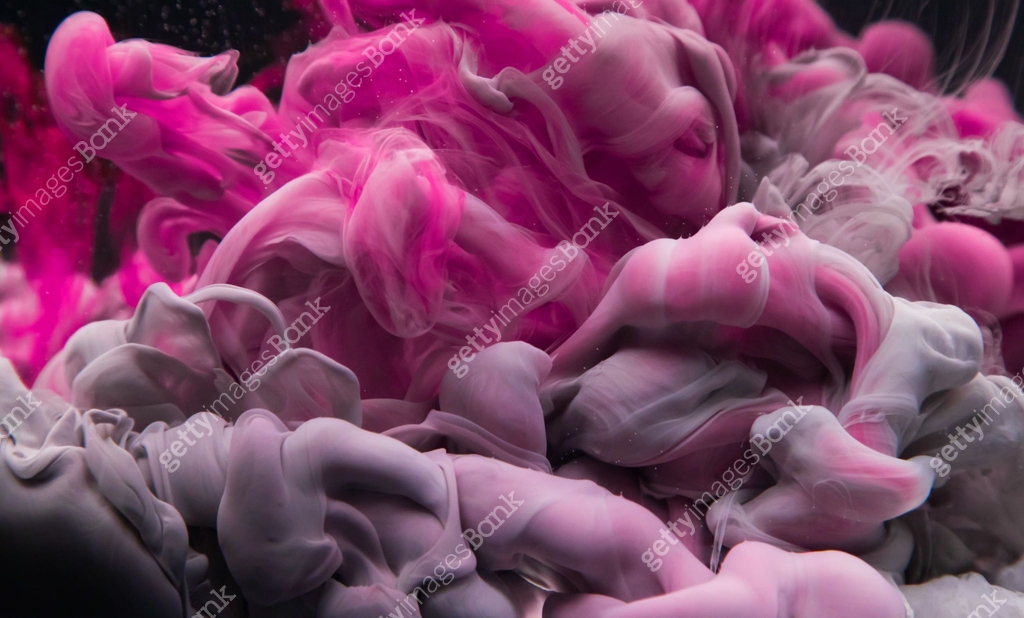 Coloured acrylic ink mixing in water on black 이미지 (1135078355) - 게티이미지뱅크