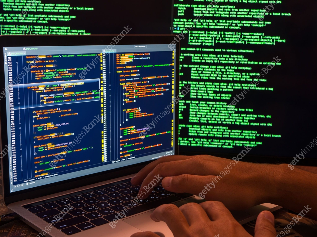 Computer crime concept, hacker breaching secure system using malicious ...