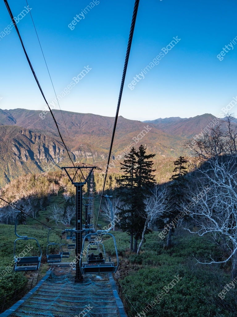 Mt.Kurodake is high peak that towers over Sounkyo Onsen in central ...