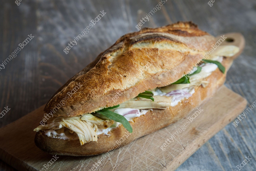 Chicken sanwdich with cream cheese in a French baguette, with some ... Chicken sanwdich with cream cheese in a French baguette, with some ...
