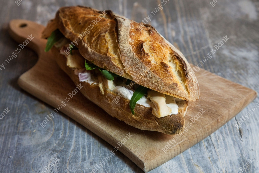 Chicken sanwdich with cream cheese in a French baguette, with some ... Chicken sanwdich with cream cheese in a French baguette, with some ...