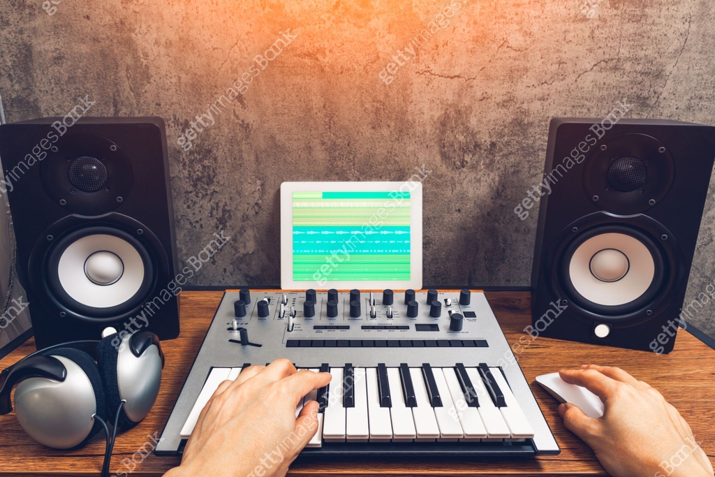 home studio, music production technology concept, male musician hands ...