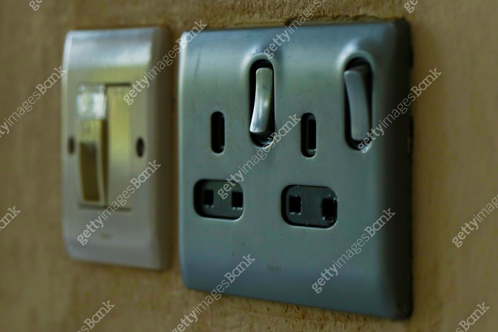 electric switch and plug point on wall 이미지 (1155585441) - 게티이미지뱅크