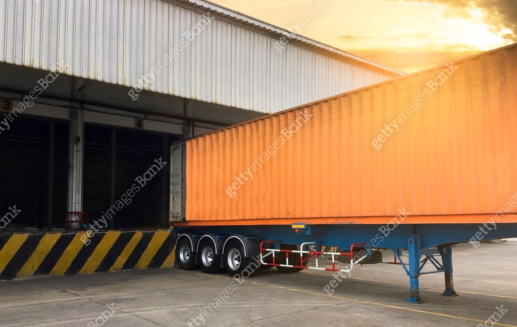 warehouse and logistics, truck container docking load cargo at ...
