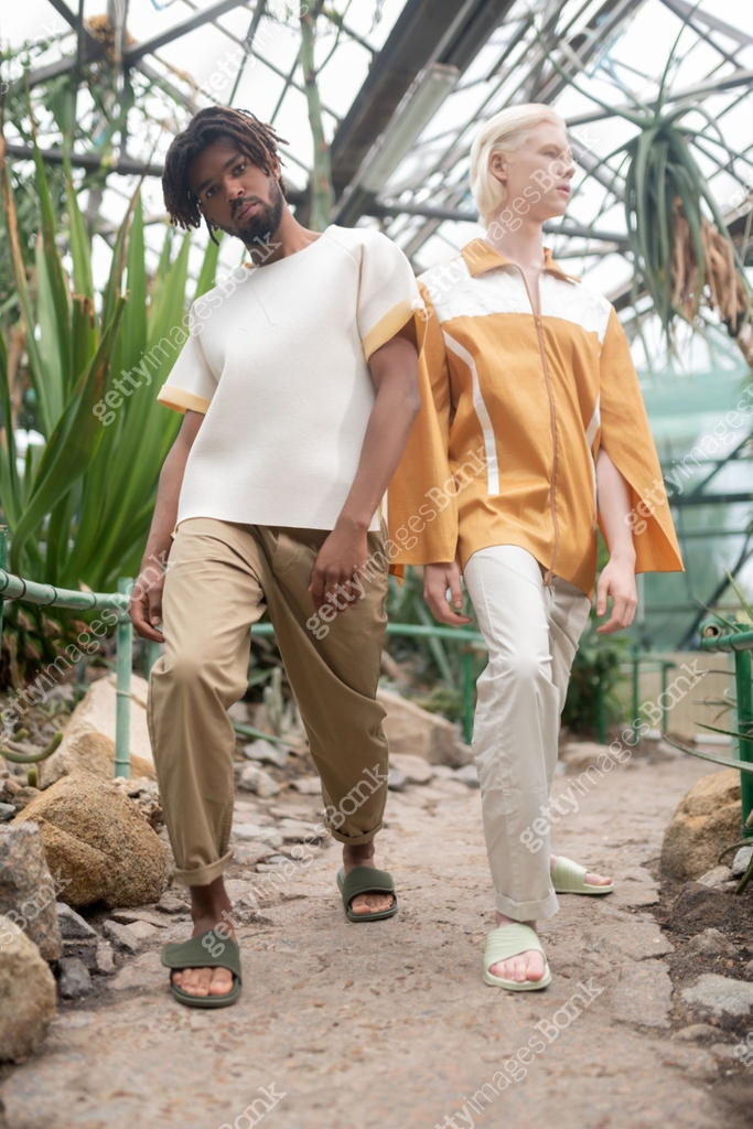Two Male Models Wearing Summer Clothes Showing Poses 1168376624 two-male-models-wearing-summer-clothes-showing-poses-1168376624
