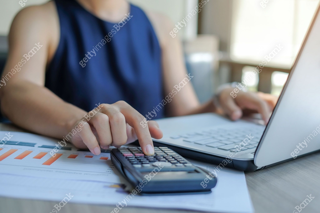 Manager Using Calculator Businesswoman using calculator for analysis maketing plan, Manager ...