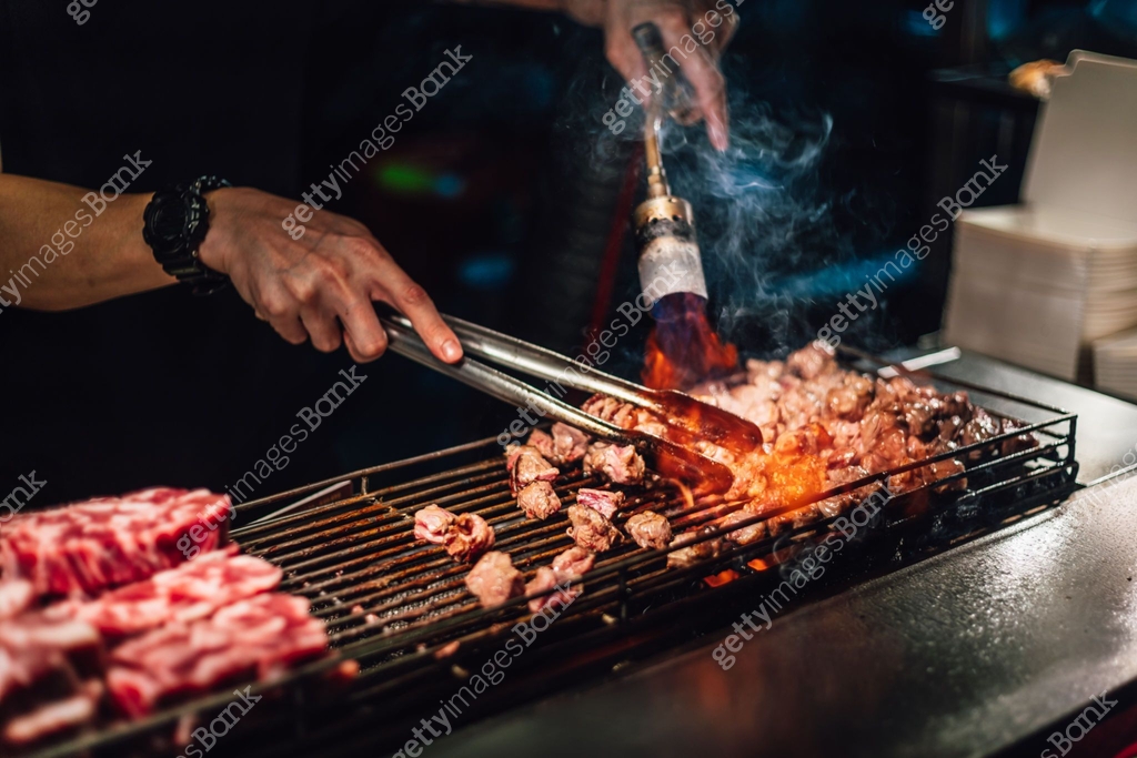 Chef cooking beef cube with blow-torched in medium rare, Juicy and ...