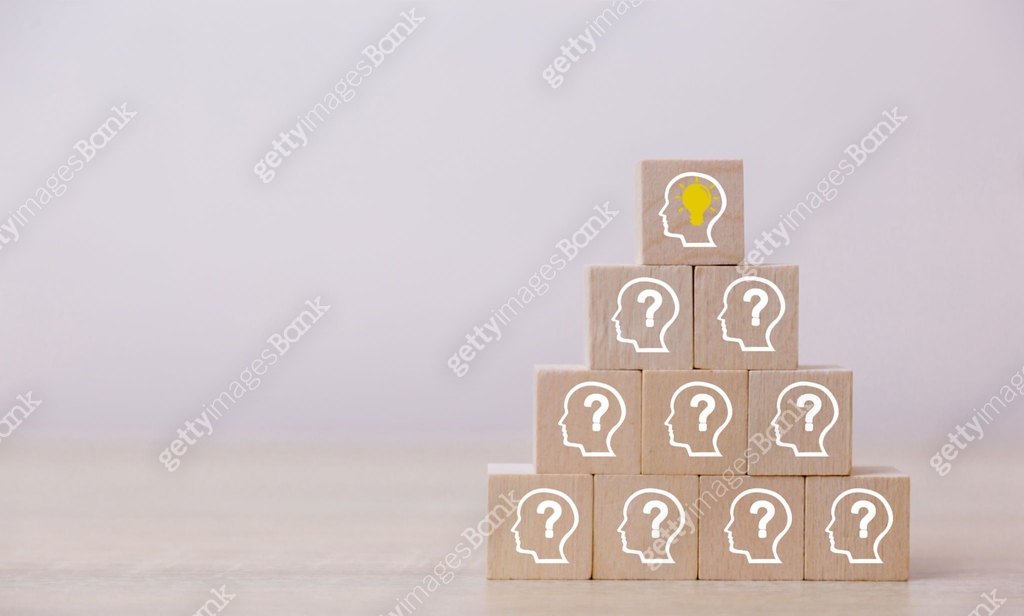 Arranging wood block stacking with icon head human symbol and light ...
