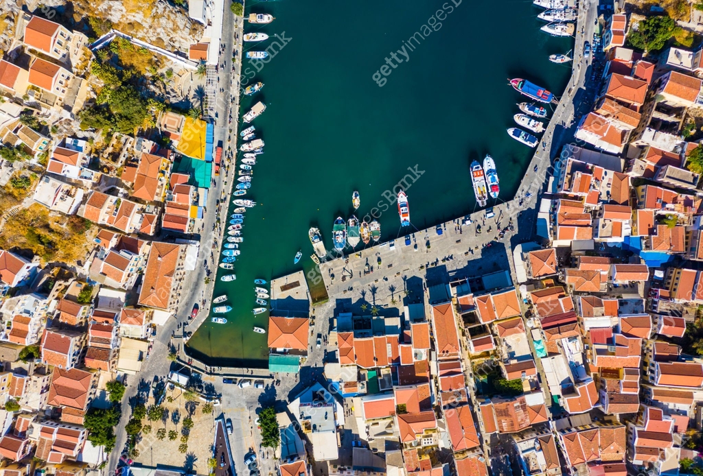 Aerial bird's eye view photo taken by drone of iconic castle of Symi in ...