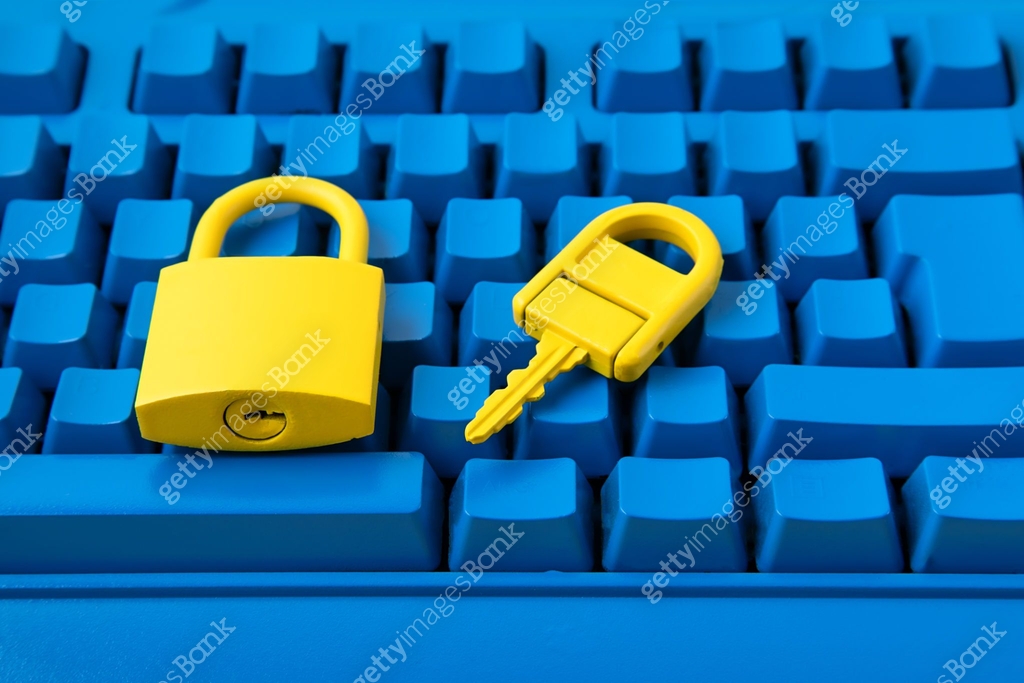 Cyber data and information security idea. Yellow padlock and key and ...