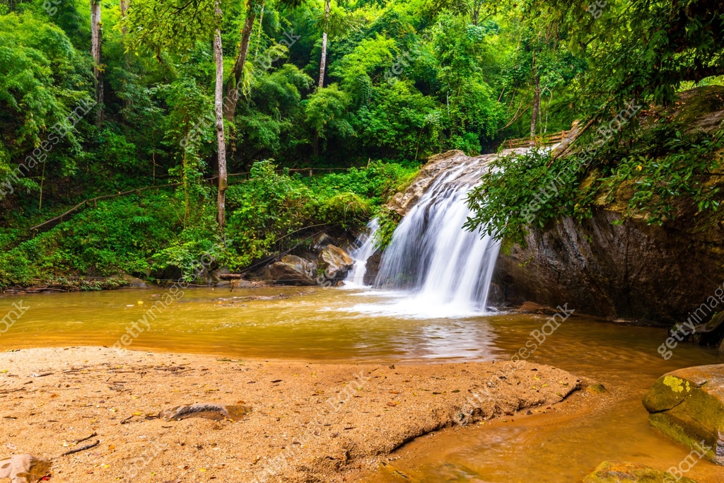 Beautiful waterfall Mae Sa, Thailand. Fresh and pure water stream is ...