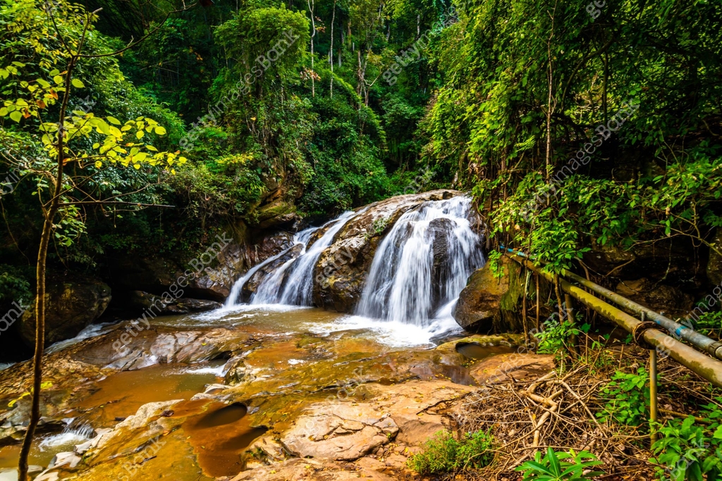 Beautiful waterfall Mae Sa, Thailand. Fresh and pure water stream is ...