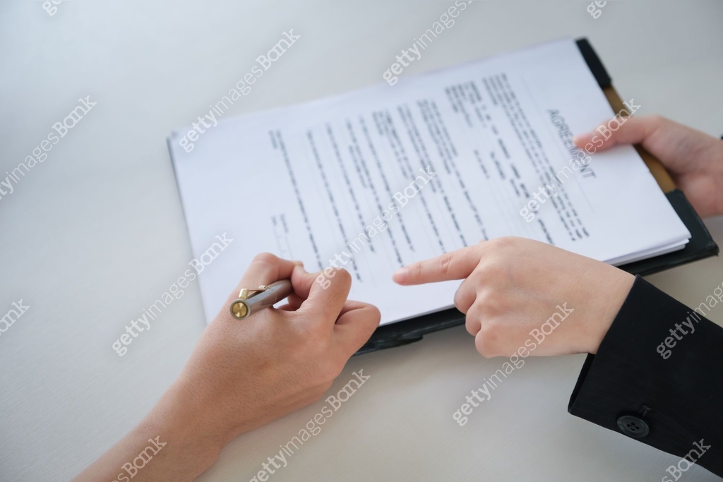 Business woman and partner sign a contract investment professional ...