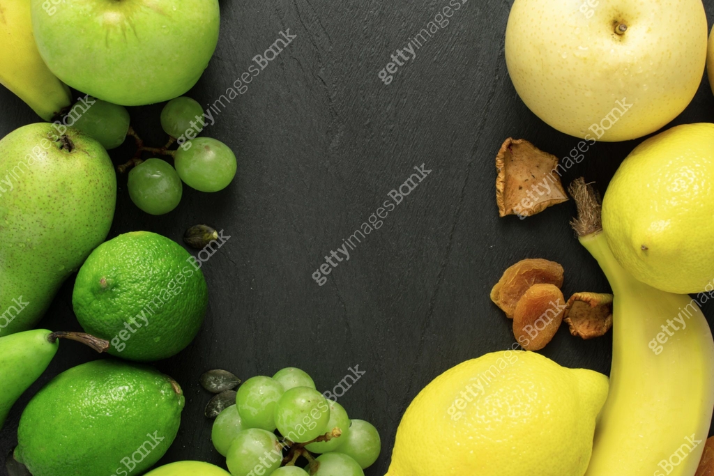 fruits background green and yellow color set, dark stone slake plate ...