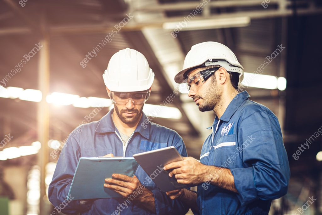 Engineer audit worker working team together with safety uniform and ...