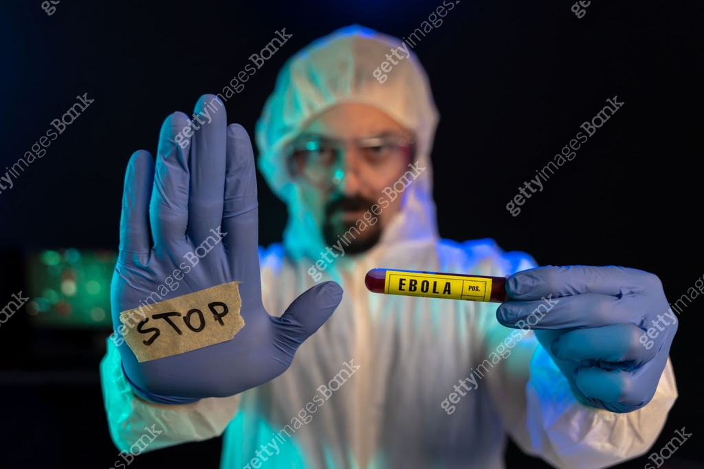 Stop Lab Sign Lab scientist looking at camera and show stop sign while holding Ebola ...