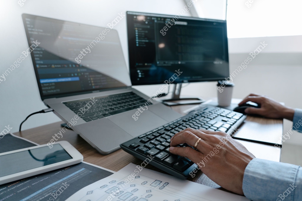 Computer Program Ng Desktop Programmer Typing Code on desktop computer, Developing programming and ...