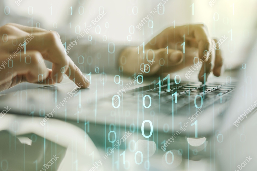 Creative abstract binary code hologram and hands typing on computer ...