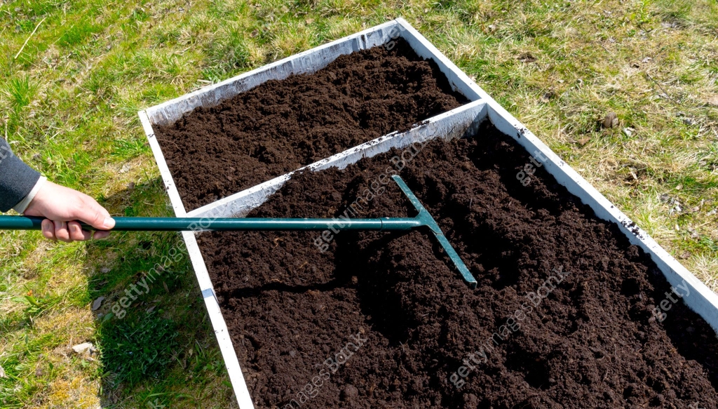Making A Land Rake Level the ground with a rake to make to prepare garden bed 이미지 ...