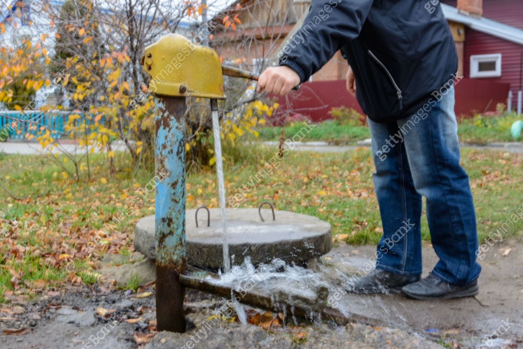 Old rusty street water standpipe. Old vintage water free standpipe ...