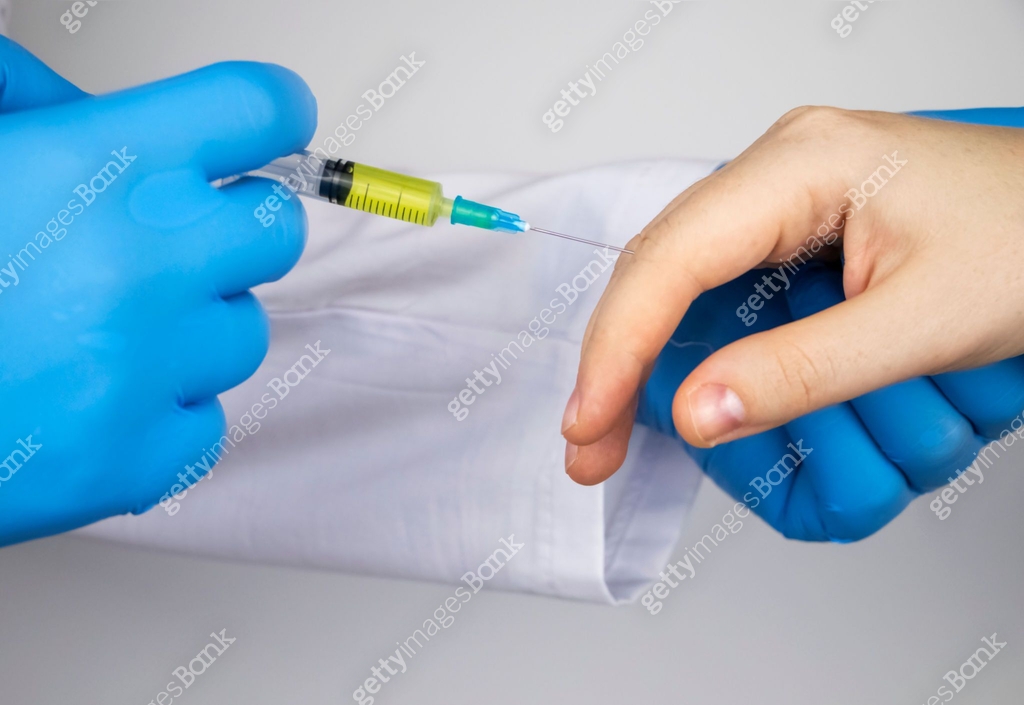 Hand Mpj Injection An orthopedic surgeon gives an injection in the finger joint. Treatment ...