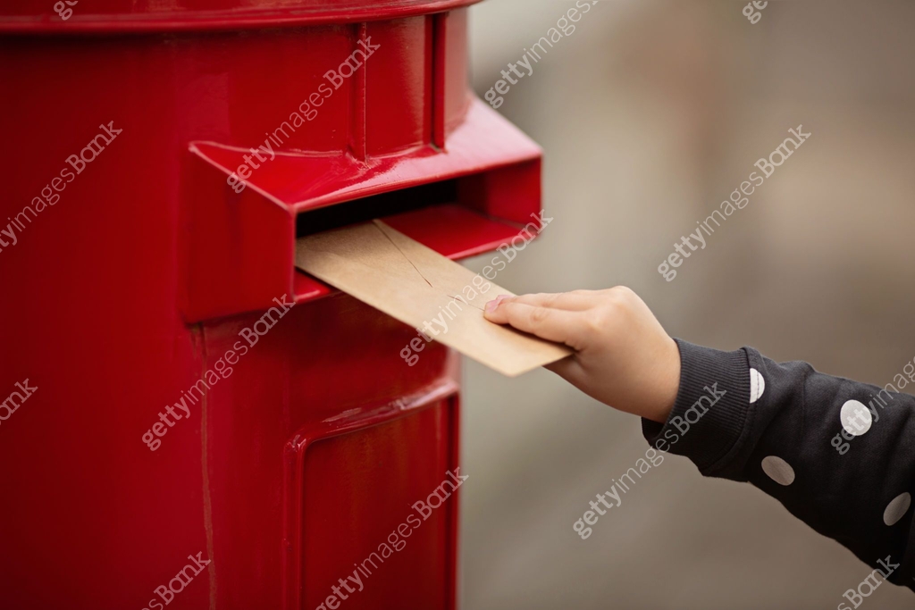 Hand holding envelope. Voting by Mail for absentee ballot or mail-in ...