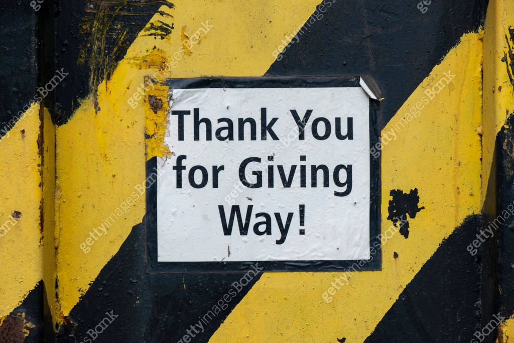 Thanks For Giving Way sign on yellow and black painted skip, container ...