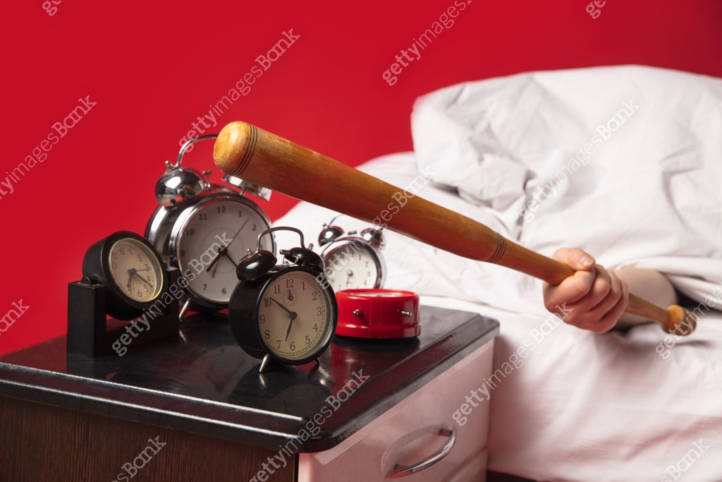 Man wakes up and he's mad at clock ringing, switches it off with ...