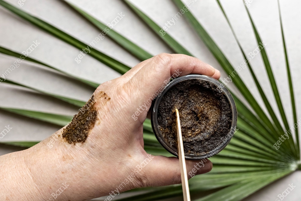 Hand Jar In a woman's hand is a jar with a Body Scrub made from natural ...