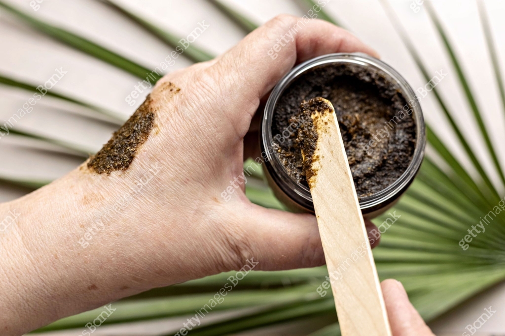Hand Jar In a woman's hand is a jar with a Body Scrub made from natural ...