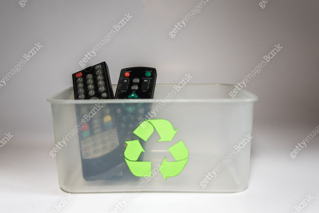Box Tv Garbage Two tv remotes on a transparent plastic recycling box 이미지 (1343337613 ...