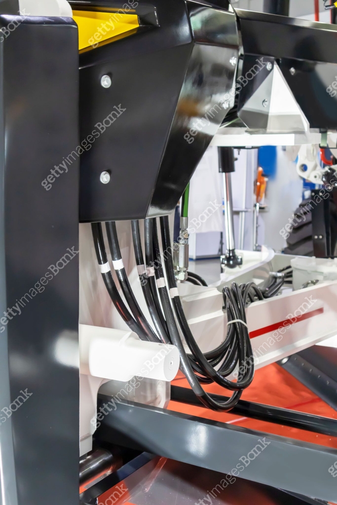 Electrical lines and equipment connecting to machinery in industrial ...