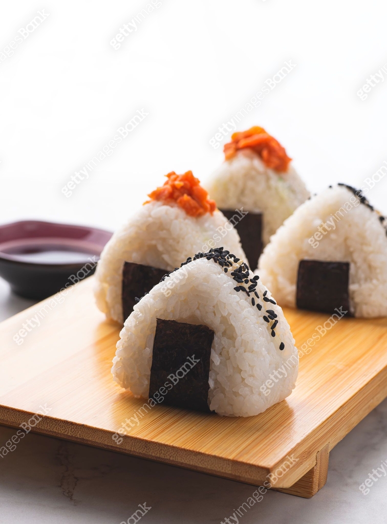 Onigiri, Japanese triangular rice balls with different fish fillings ...