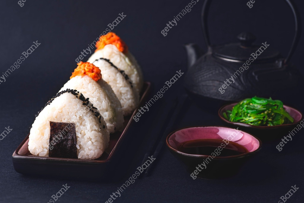 Onigiri, Japanese triangular rice balls with different fish fillings ...