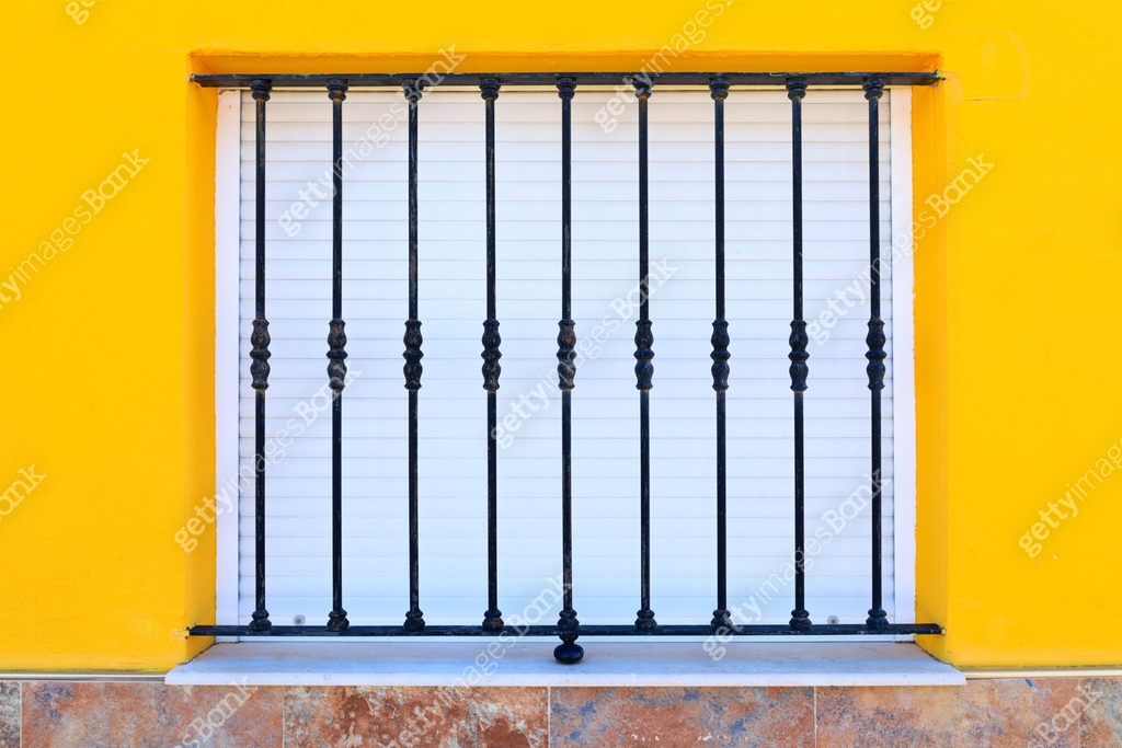 Yellow facade with window and wrought iron railing 이미지 (2187490333 ...