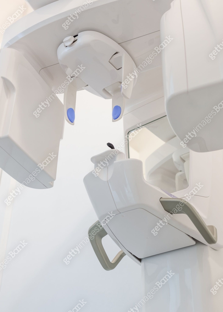 Vertical shot of a panoramic dental X-ray machine (orthopantomograph ...