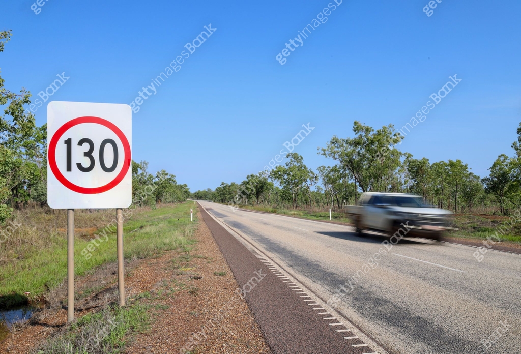 130 km/h road sign. Motion blur of passing speeding vehicle. Northern ...
