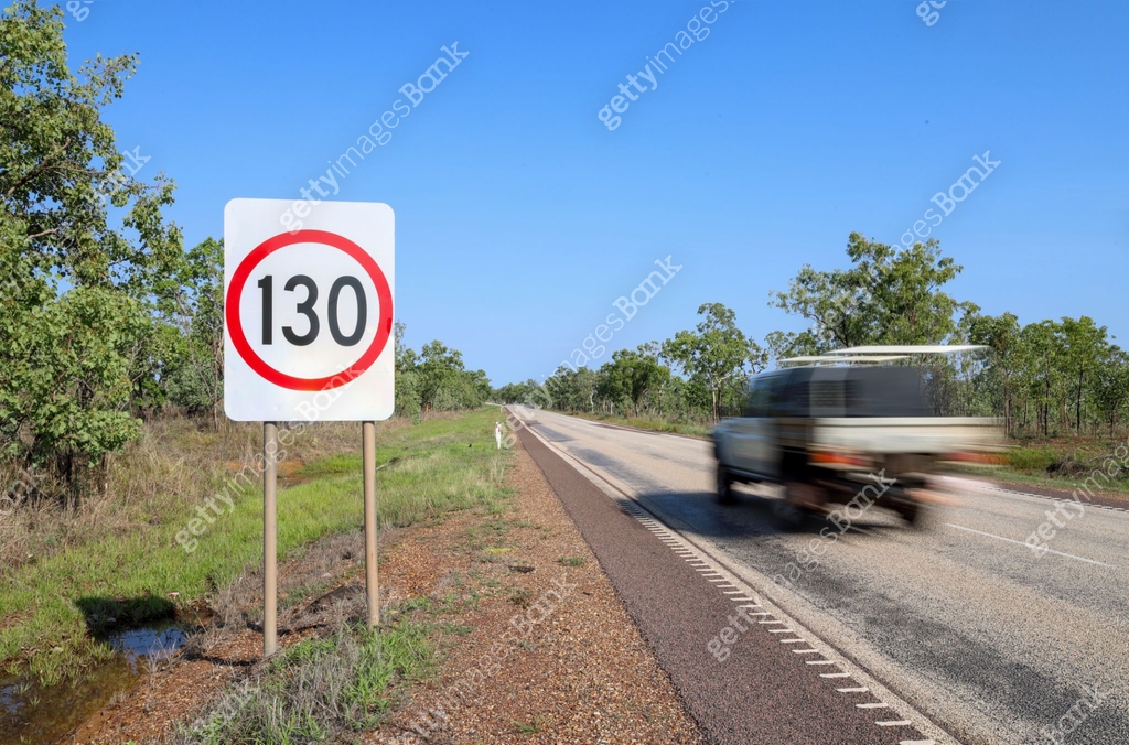130 km/h road sign. Motion blur of passing speeding vehicle. Northern ...