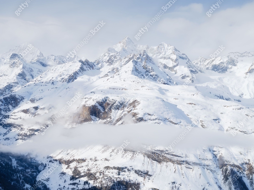 Cold Rocks Mountains Winter mountain scene. High sharp rocks and snow. Cold weather and ...